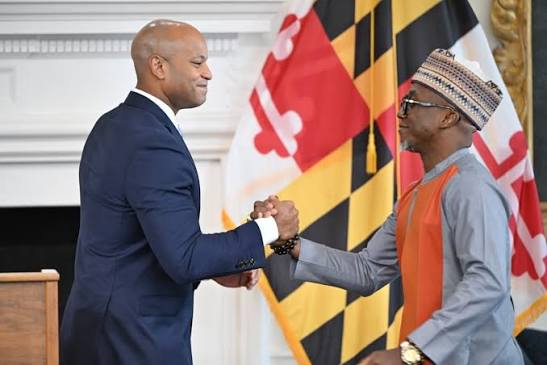 C. Vincent Iweanoge with Maryland Governor Wes Moore